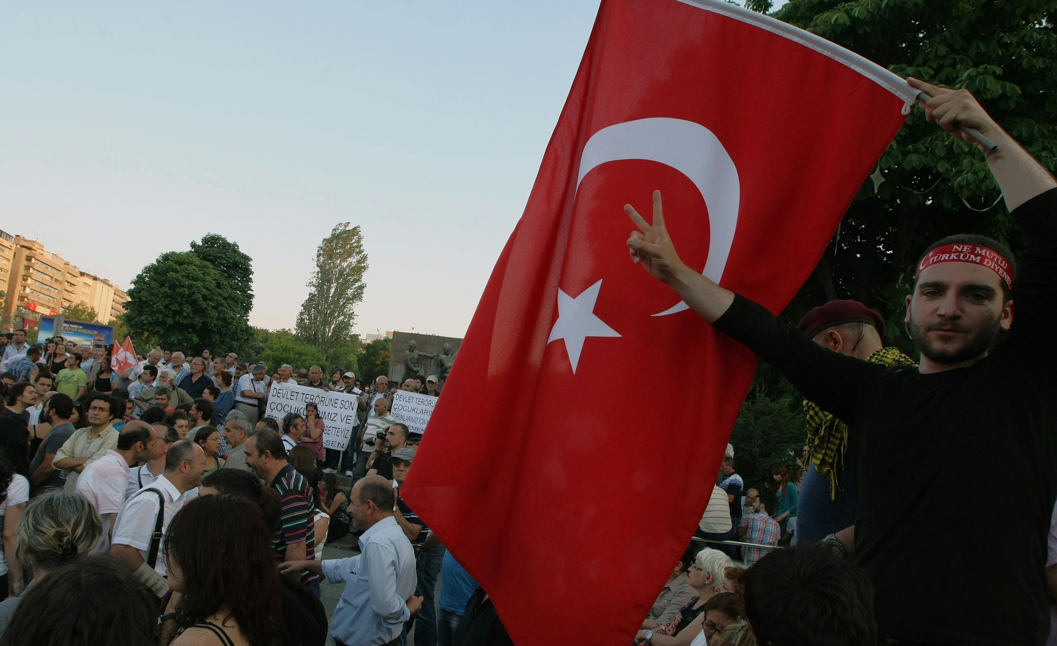 Turkish protesters gather for a protest and a forum at the main Kizilay Square in Ankara, Turkey, Tuesday, June 25, 2013. Turkish police on Tuesday detained at least 20 people allegedly involved in violent protests, as prime minister Recep Tayyip Erdogan continued to lash out at protesters ó and a BBC journalist ó he claimed were part of a conspiracy to harm Turkey. Erdogan reiterated that the protests were orchestrated by forces wanting to prevent Turkeyís rise.(AP Photo/Burhan O