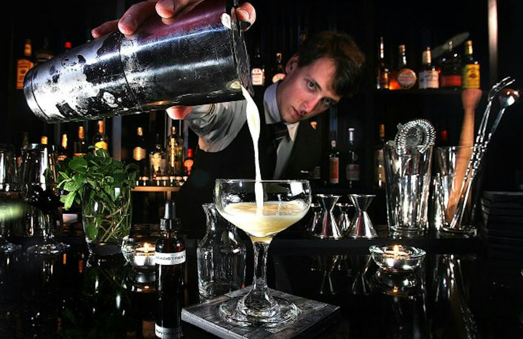 Bartender Birk Grudem mixed a Bradstreet cocktail at the Bradstreet Crafthouse Restaurant at the Graves|601 Hotel in Block E in Minneapolis.