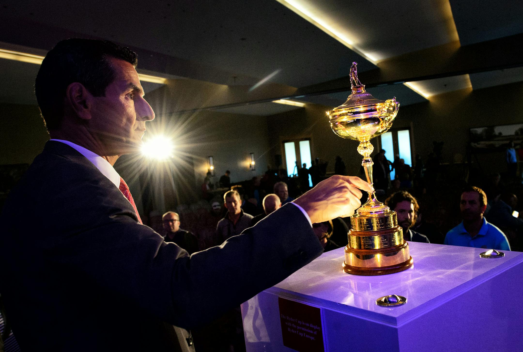 PGA Communications Director Julius Mason placed the Ryder Cup trophy for a photo opportunity. ] GLEN STUBBE * gstubbe@startribune.com Tuesday September 29, 2015 Ryder Cup captains and Davis Love and Darren Clarke spoke at a press conference at Hazeltine National Golf Club, home of the 2016 Ryder Cup.