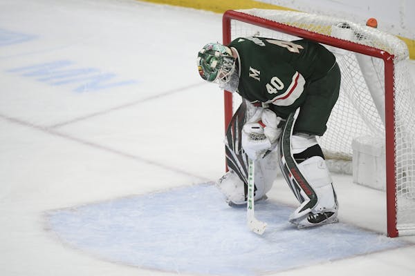 Minnesota Wild goaltender Devan Dubnyk (40) was dejected following a goal by Anaheim Ducks right wing Corey Perry (10) in the third period.