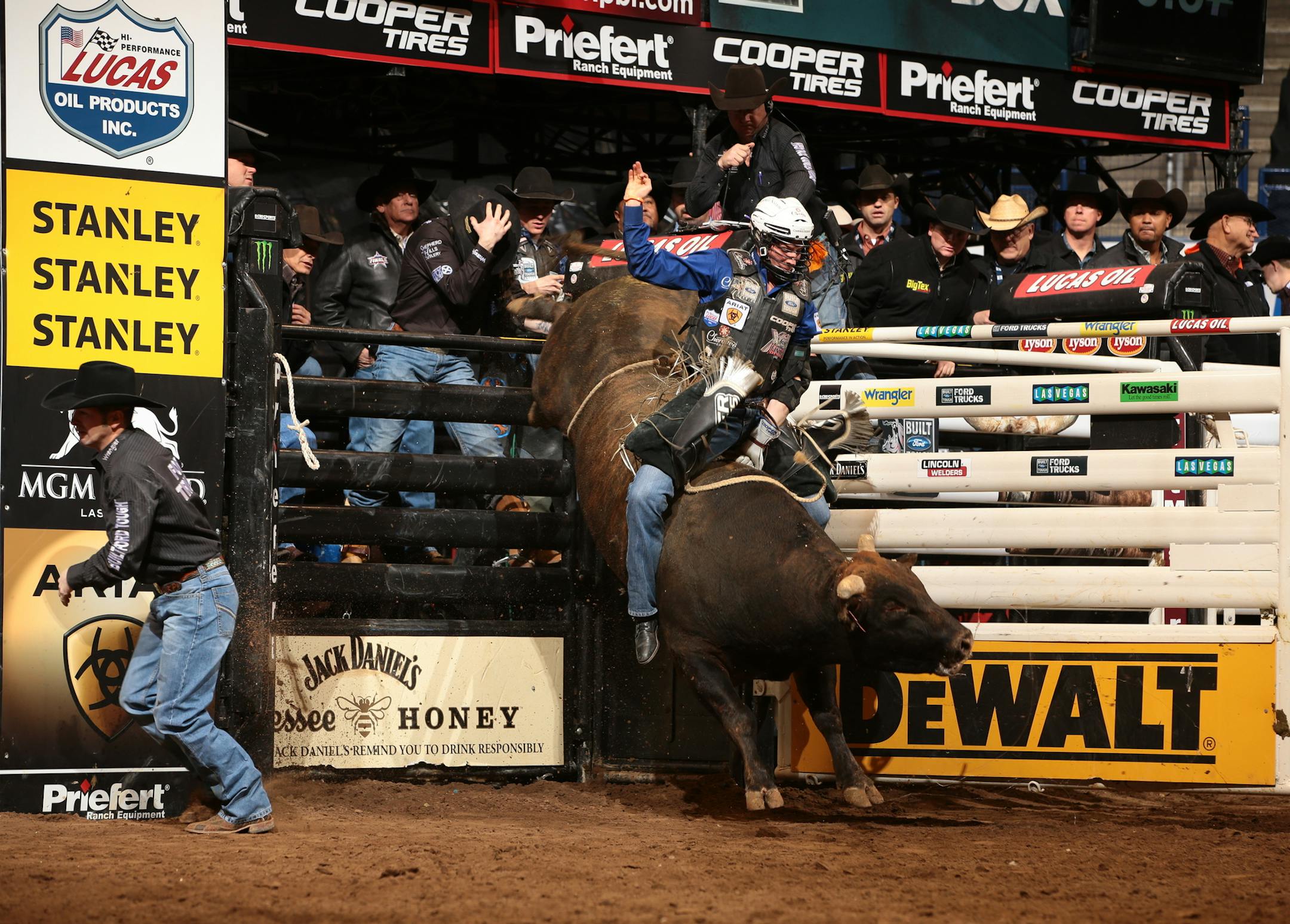 Ryan Dirteater attempts to ride D&H's Magic Train during the first round of the Oklahoma City Built Ford Tough series PBR. Photo by Andy Watson. this is Jared Allen's bull. We have permission to use this picture.