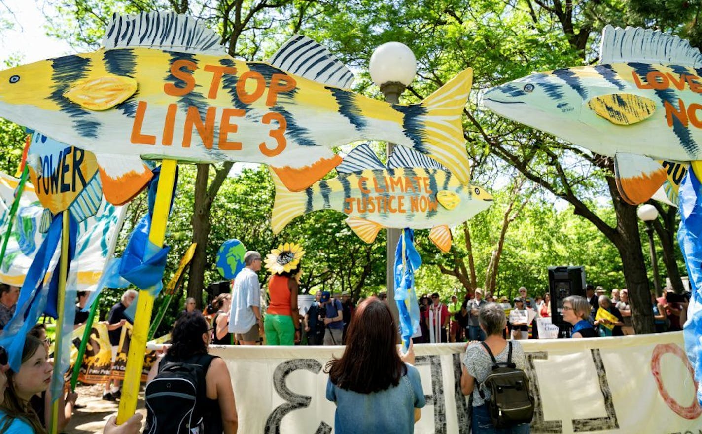 Over a hundred people attended a rally in Leif Erickson Park across from the State Capitol to call for a halt in the construction of Enbridge's Line Three that would go through tribal lands.