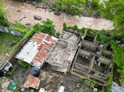 An aerial view of a home damaged by Hurricane Beryl in Kingston, Jamaica, Thursday, July 4, 2024.