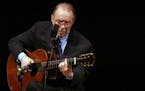FILE - In this June 18, 2004 file photo, Brazilian composer Joao Gilberto performs at Carnegie Hall, in New York. The Brazilian singer and composer, w