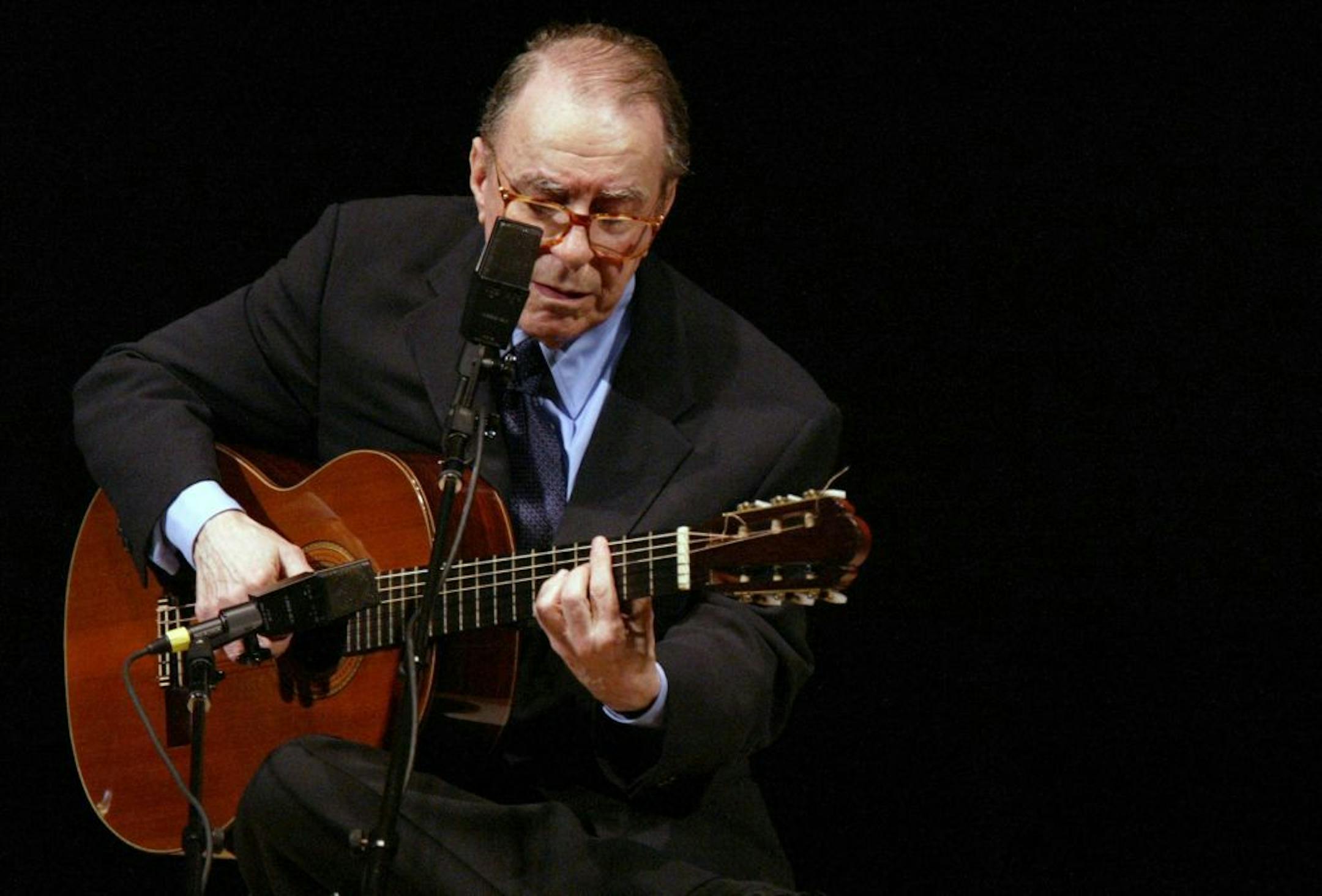 FILE - In this June 18, 2004 file photo, Brazilian composer Joao Gilberto performs at Carnegie Hall, in New York. The Brazilian singer and composer, who is considered one of the fathers of the Bossa Nova genre, has died. His death was confirmed by his children on Saturday, July 6, 2019. Gilberto was 88 years old.