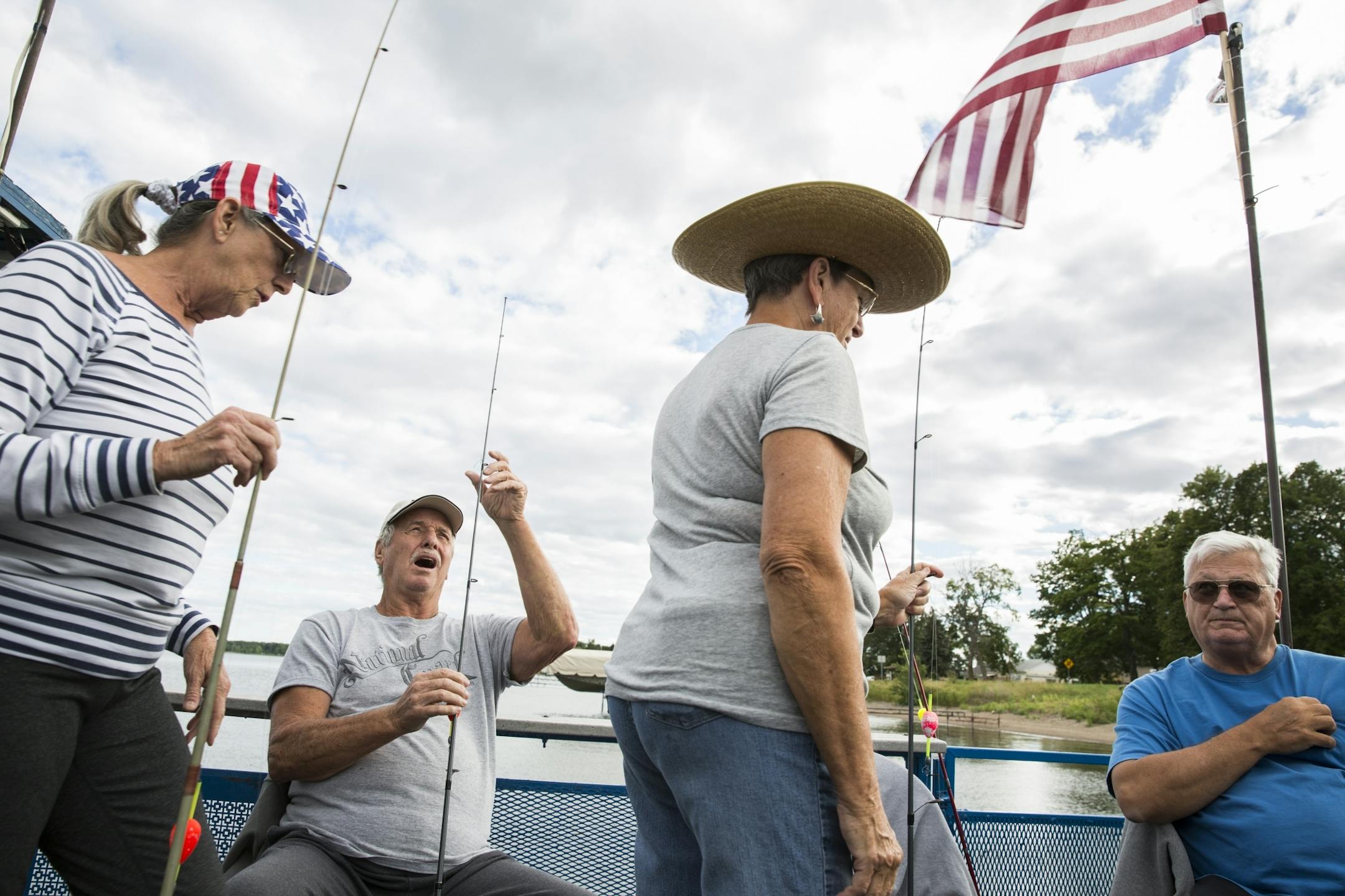 Frankie and Dick Giarrusso, from left, of East Bethel in the summer and Texas in the winter, and Jeaanne and Bob Messersmith, of East Bethel in the summer and Florida in the winter, get ready to fish on Mille Lacs Lake Monday, August 3, 2015.