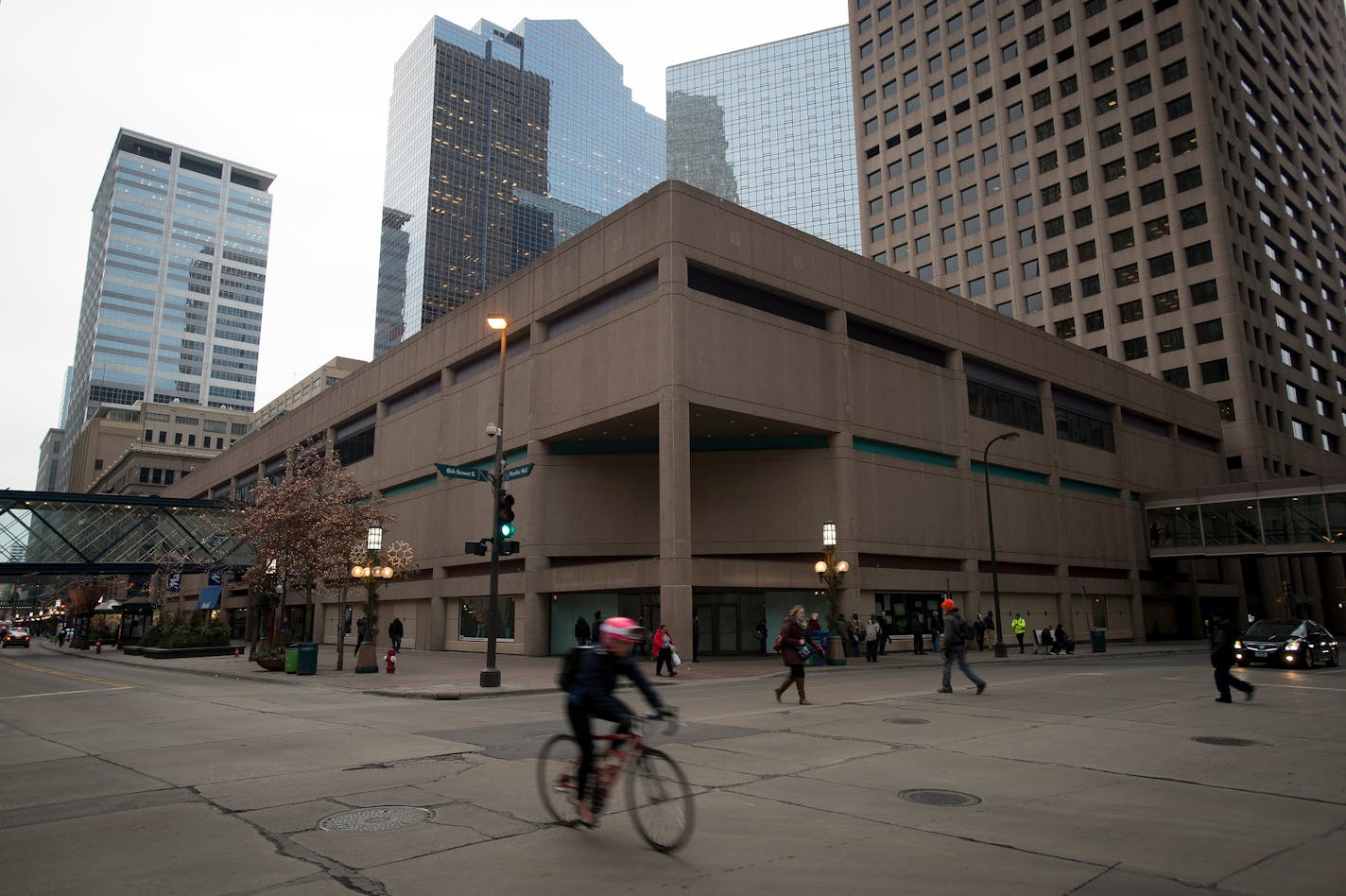 Commuters make their way past the future location of Saks Off 5th at City Center on Tuesday afternoon. ] (Aaron Lavinsky | StarTribune) Saks Off 5th, which closed its downtown Minneapolis location this month, said Tuesday that it will return in April 2016. The outlet store will reopen in City Center, at the same intersection of Nicollet Mall and 6th Street, but across the street from its former location, marking a significant win for the city�s downtown vibrancy. The store will occupy two floors