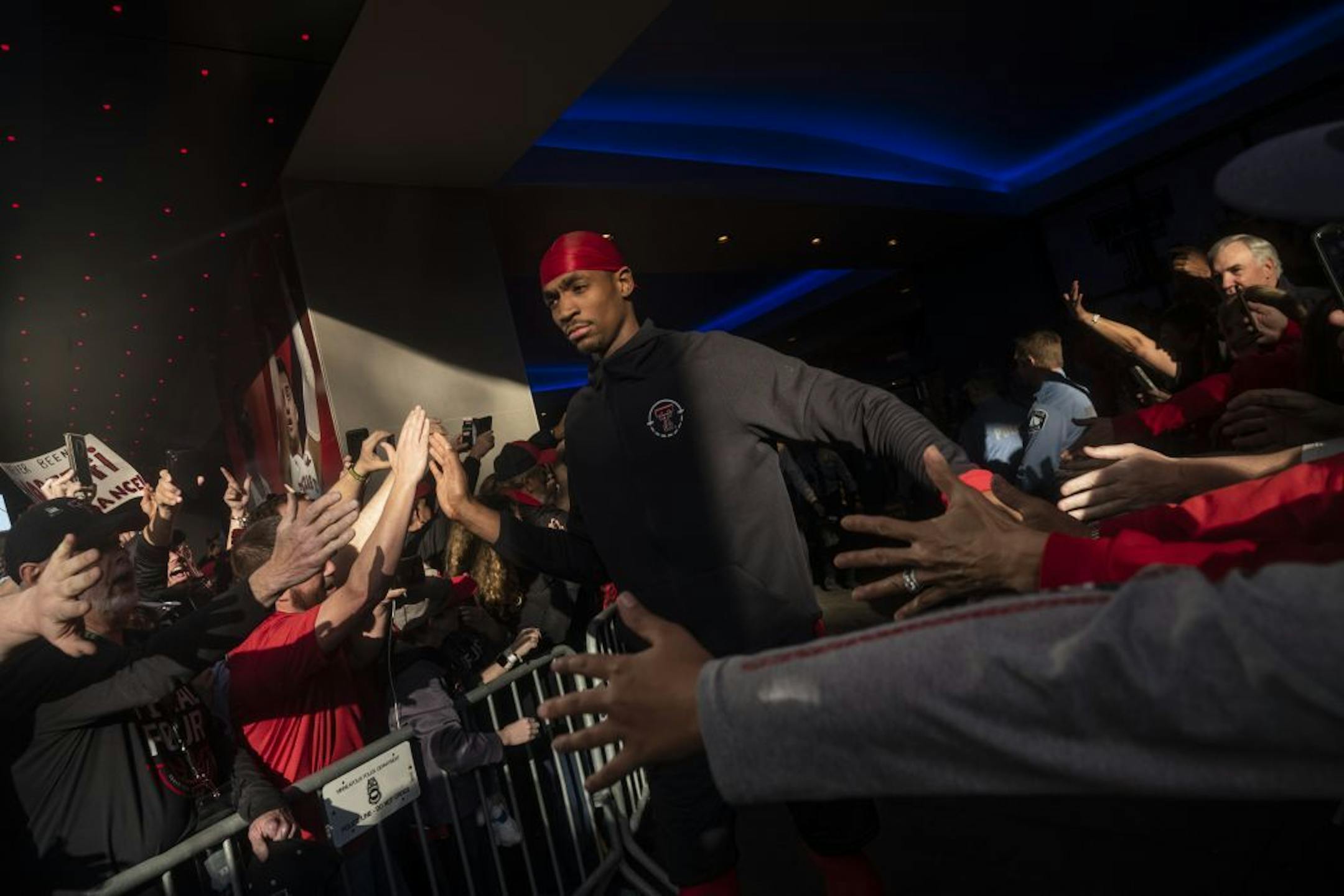 Texas Tech fans send their players off including Tariq Owens they head to U.S. Bank Stadium to face Virginia in the NCAA men basketball championship game.