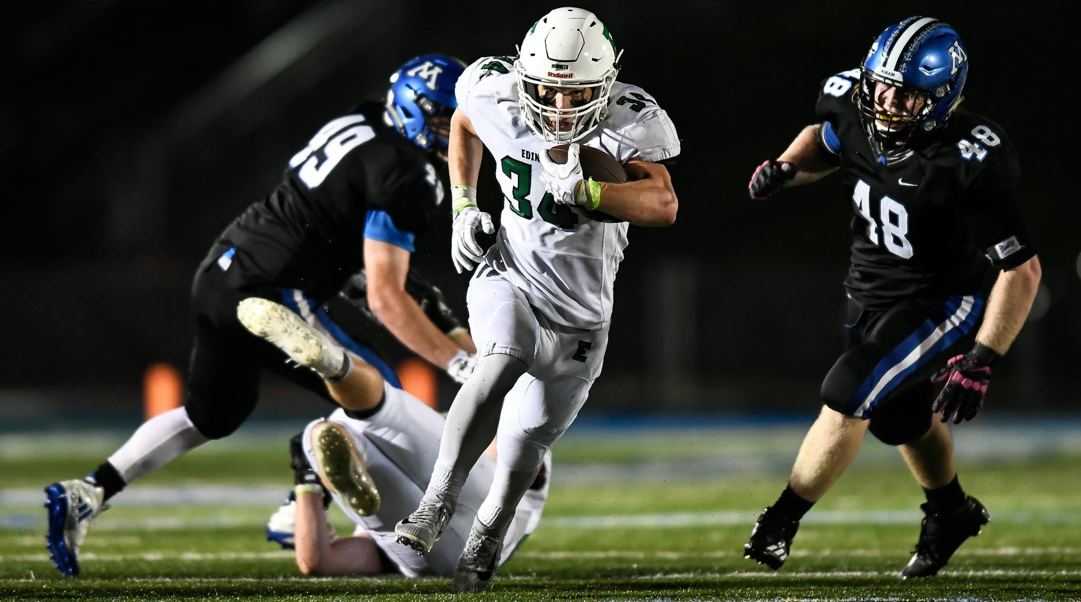 Edina running back Matt Cavanagh (34) ran the ball for a critical first down late in the fourth quarter against Minnetonka. ] AARON LAVINSKY ï aaron.lavinsky@startribune.com Minnetonka played Edina in a high school football game on Friday, Oct. 6, 2017 at Minnetonka High School in Minnetonka, Minnesota.
