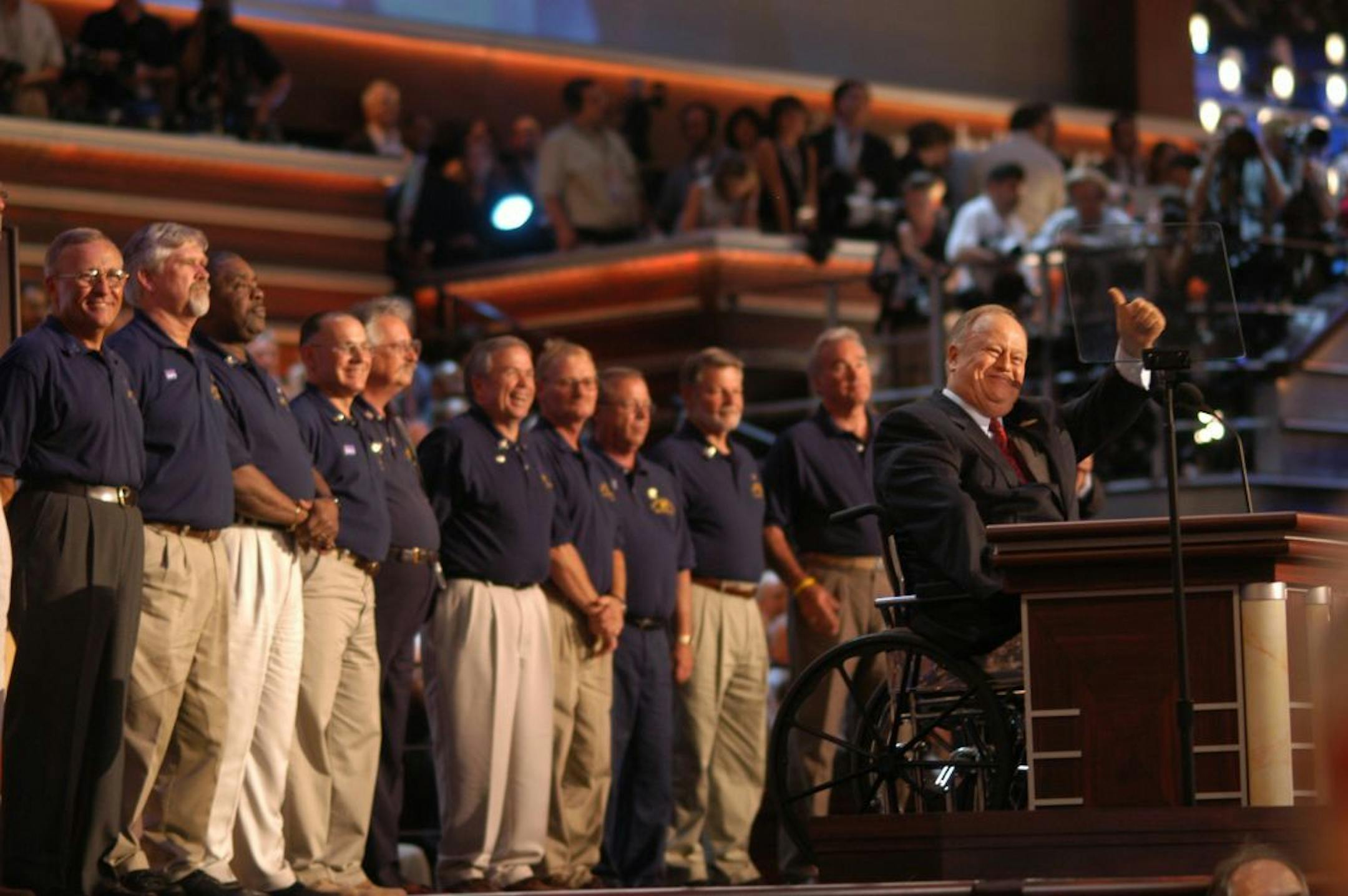 Boston, MA Thursday 7/29/2004 Richard Sennott/star tribune Democratic national convention Max Cleland gives the thumbs up with John Kerry's Swift boat crew members while giving the intro speech to john kerry
