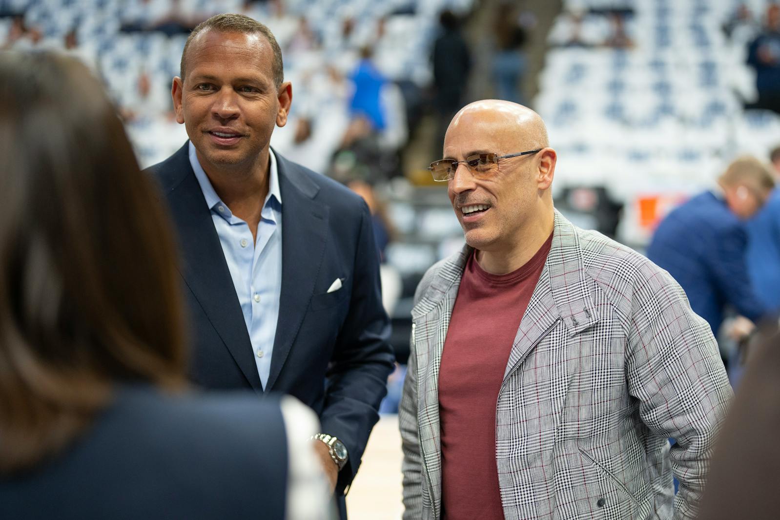 Alex Rodriguez and Marc Lore shown before a Timberwolves playoff game in May 2025. 