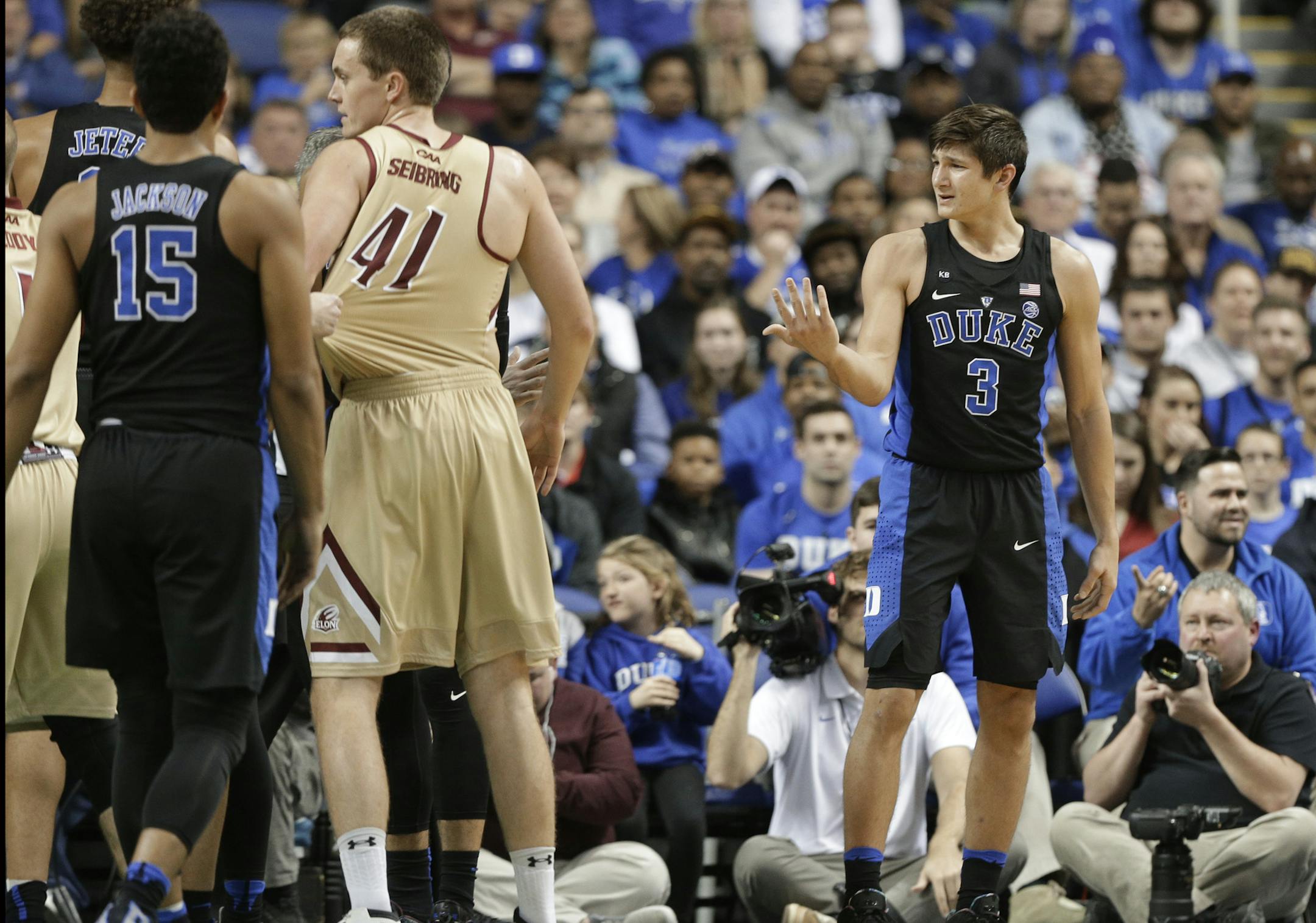 Duke's Grayson Allen (3) reacts after being called for a foul from tripping a Elon player in the first half of an NCAA college basketball game in Greensboro, N.C., Wednesday, Dec. 21, 2016. (AP Photo/Chuck Burton) ORG XMIT: NCCB108