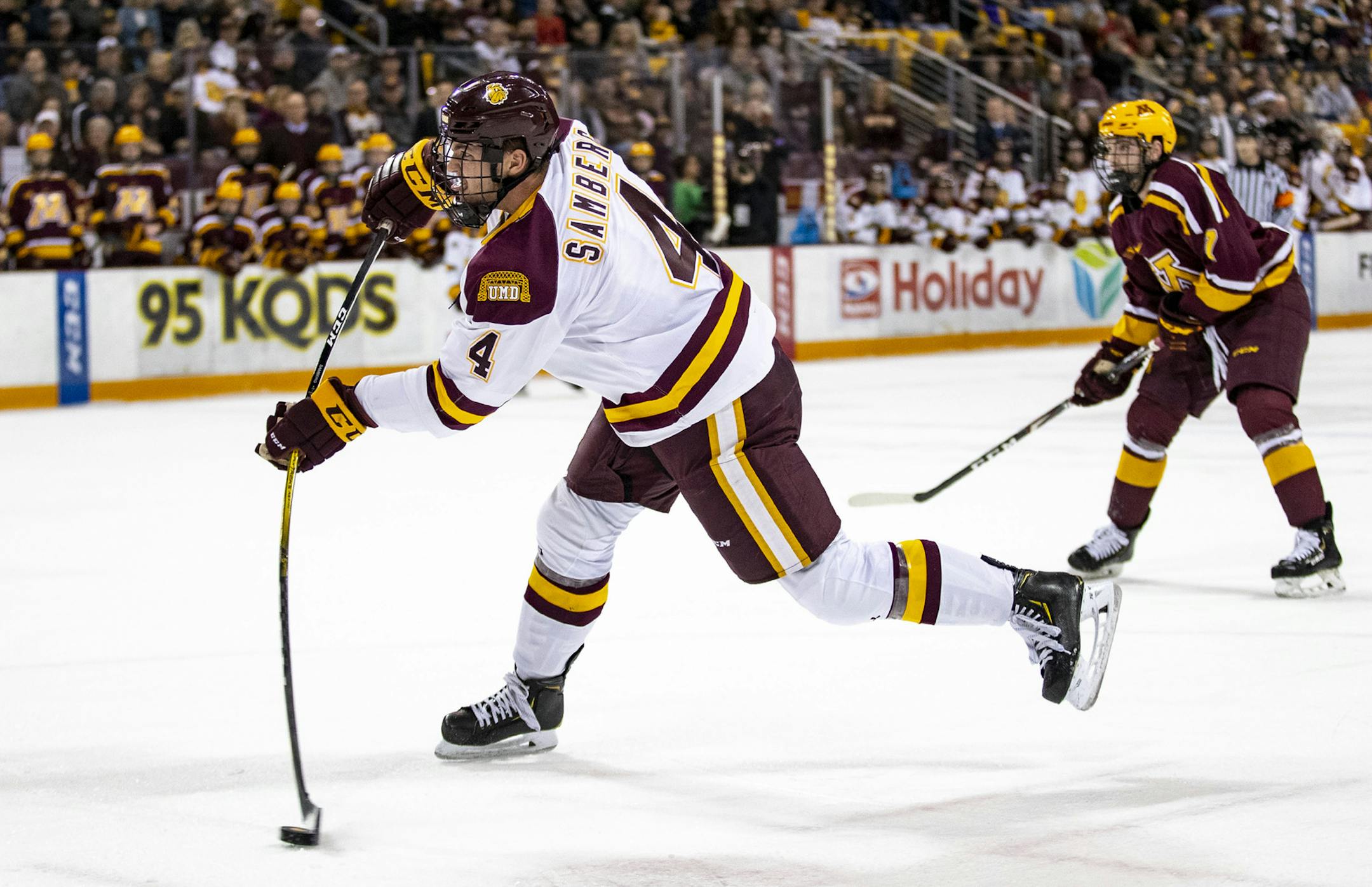 UMD defenseman Dylan Samberg (4) took a shot on goal in the first period. ]
ALEX KORMANN • alex.kormann@startribune.com The University of Minnesota Duluth hockey team hosted the University of Minnesota at Amsoil Arena on Saturday October 26, 2019.