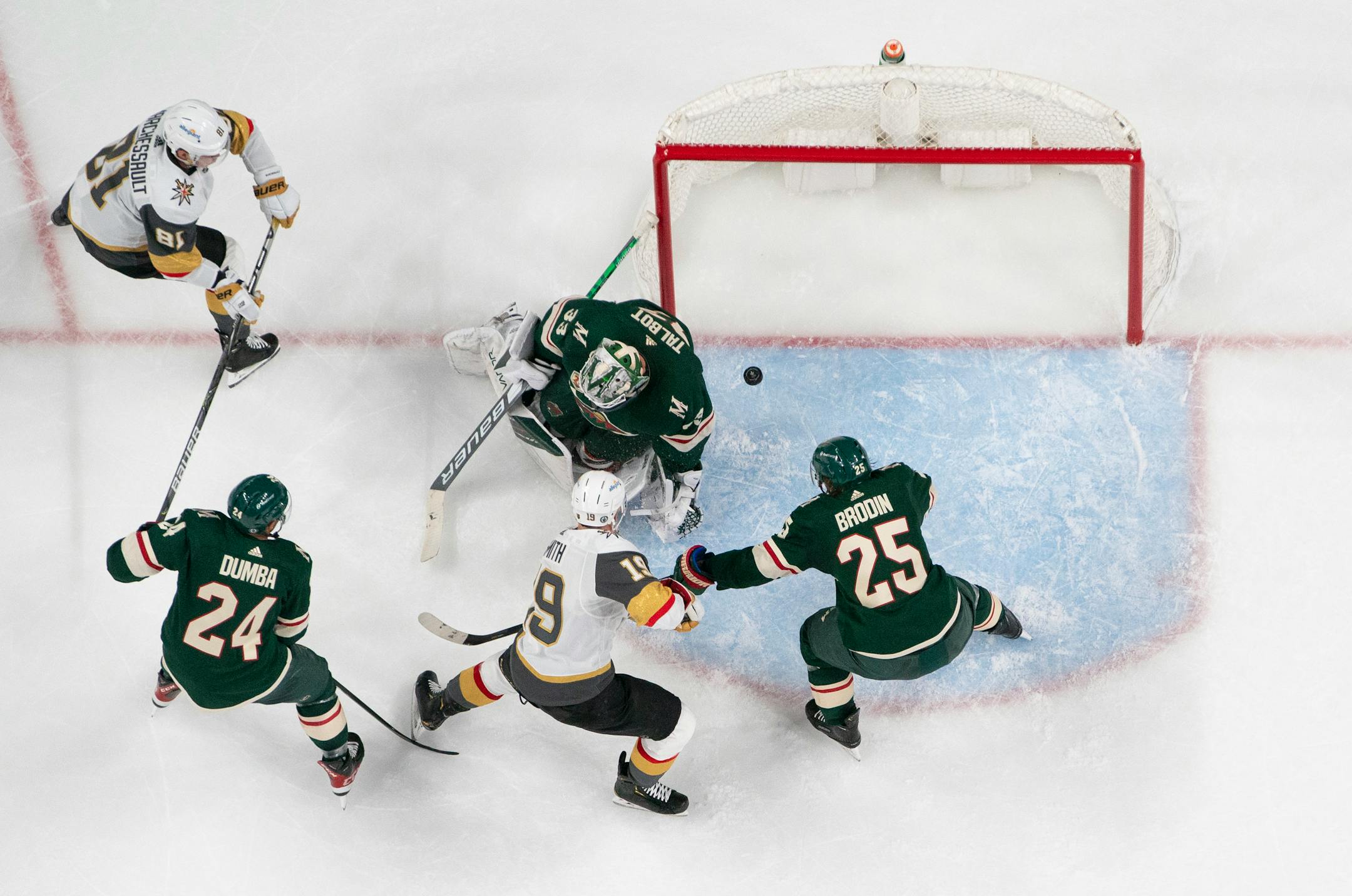 Vegas Golden Knights right wing Reilly Smith (19) slipped the winning goal past Minnesota Wild goaltender Cam Talbot (33) despite the efforts of Wild defenseman Jonas Brodin (25) in the second period.