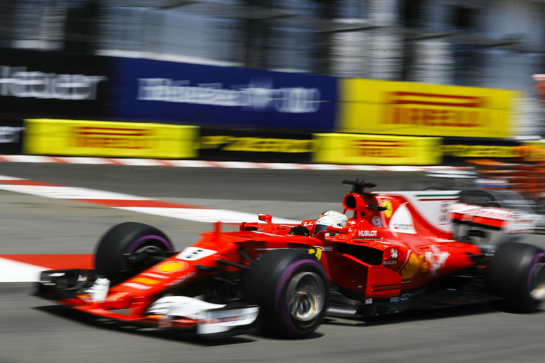 Ferrari driver Sebastian Vettel of Germany steers his car during the qualifying session for the Formula One Grand Prix at the Monaco racetrack in Monaco, Saturday, May 27, 2017. (AP Photo/Frank Augstein)