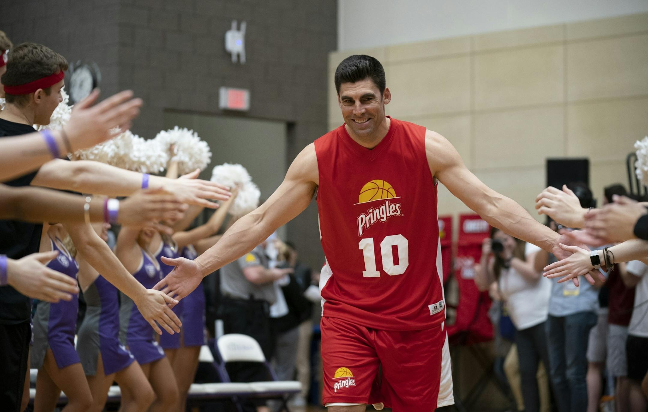 Former Timberwolf Wally Szeerbiak was introduced with Team Pringles.