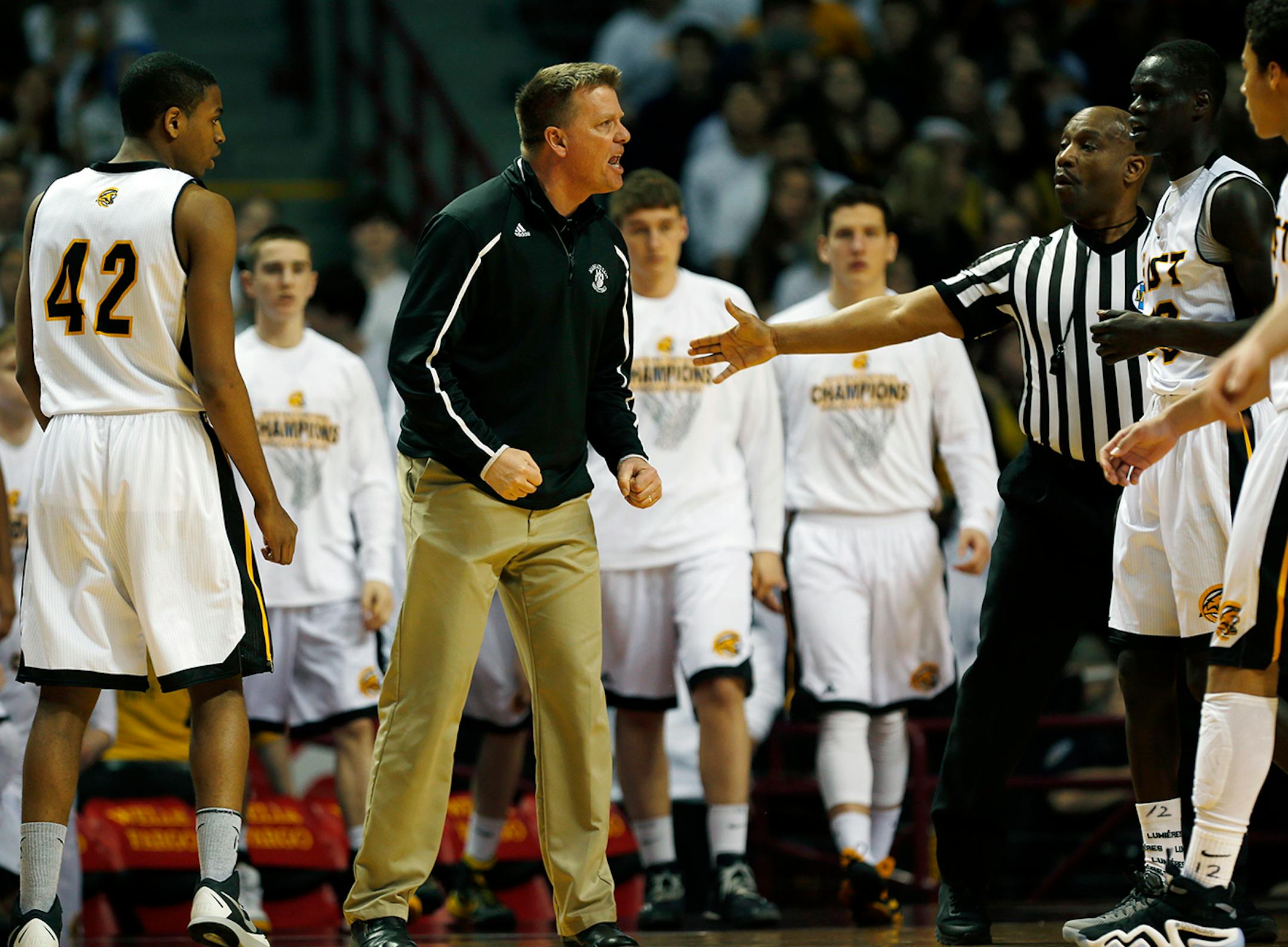 In the boys' 3A quarterfinal between New Prague and Mankato East, ME coach Joe Madson got fired up .]Richard Tsong-Taatarii/rtsong-taatarii@startribune.com