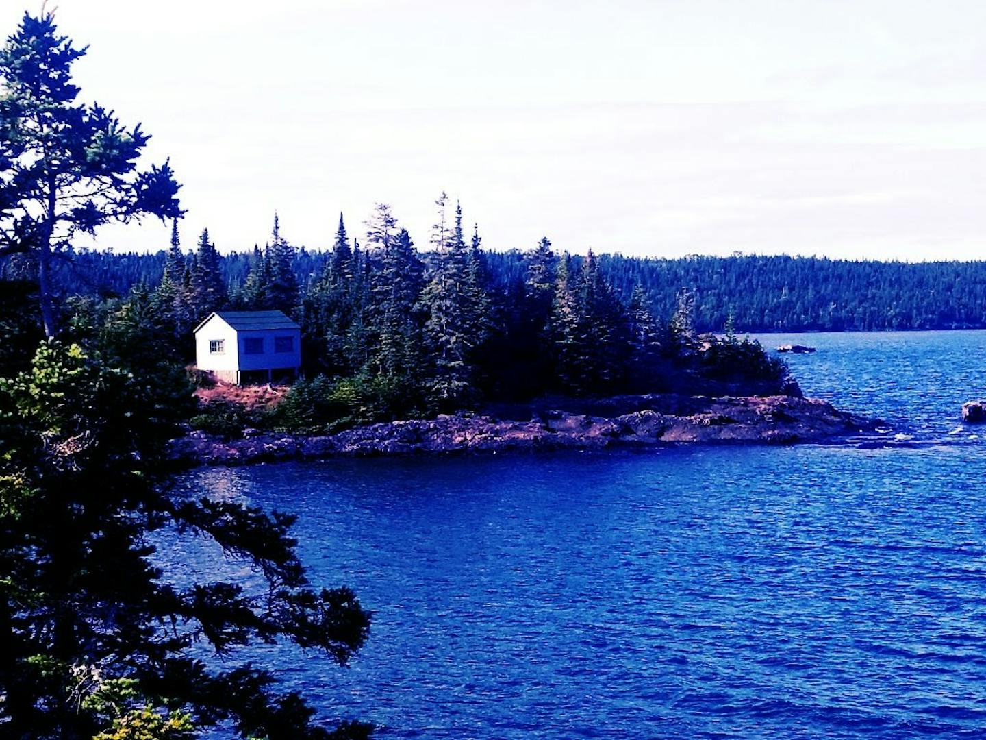 The lakeside cabin on Isle Royale where Huckfelt holed up to write many of his new songs.