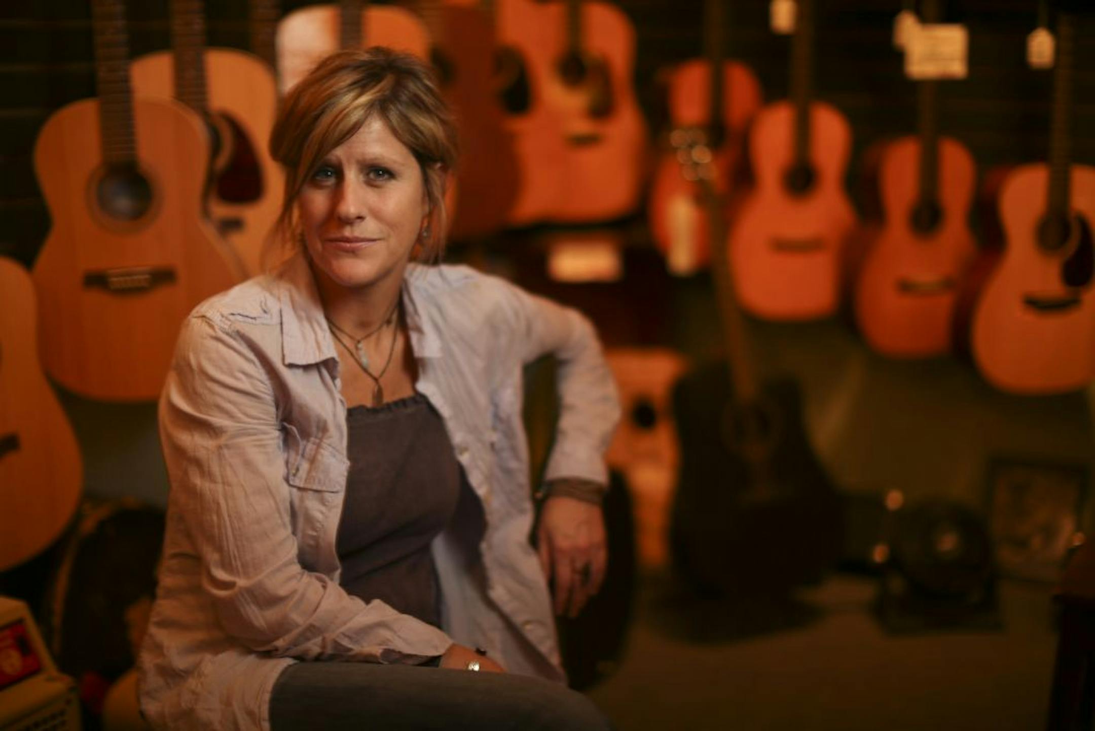 Musician Molly Maher also works at Willie's American Guitars in St. Paul.