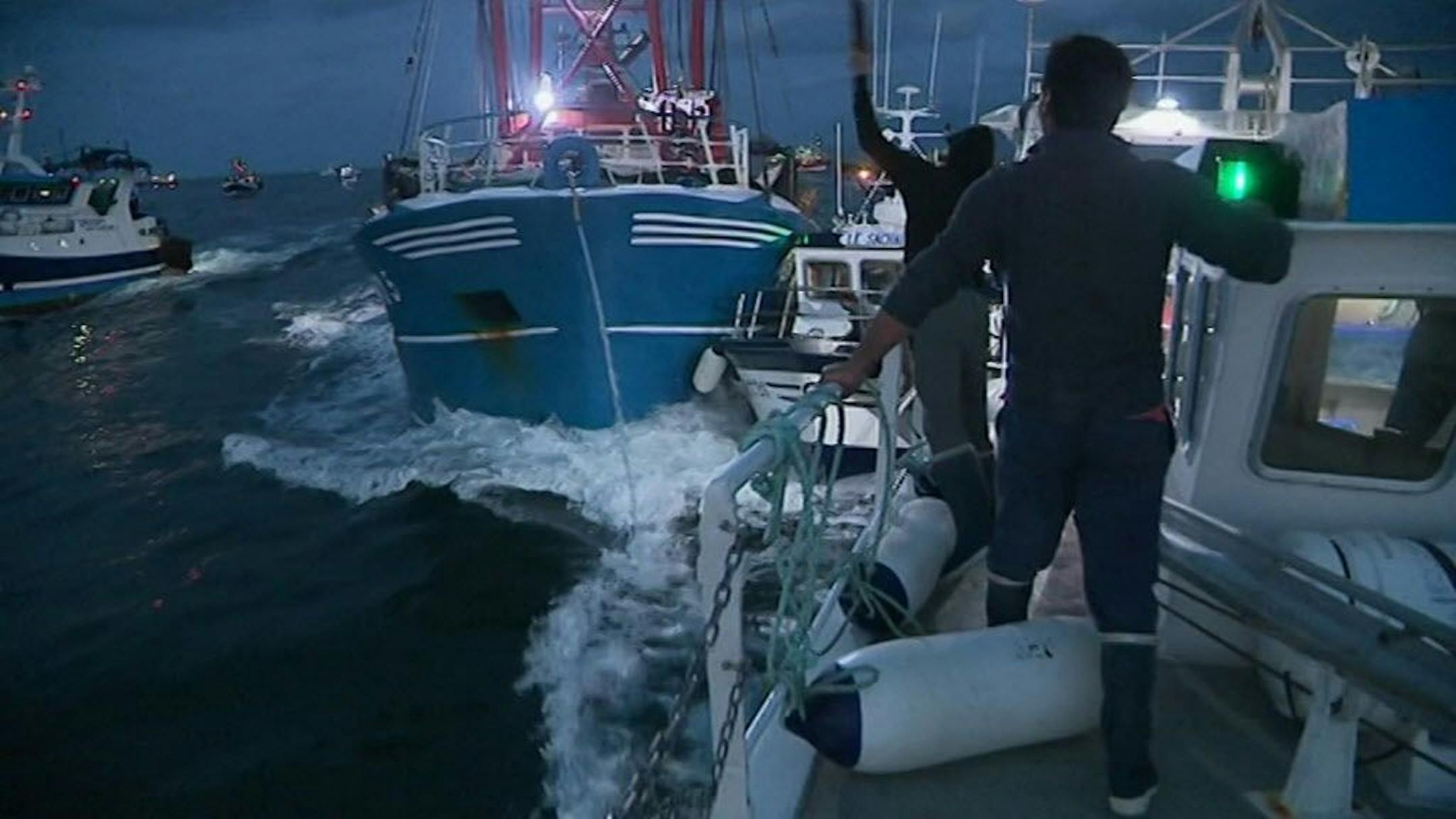 In this image taken from France 3 video, French and British boats clash off France's northern coast, early Tuesday Aug. 28, 2018. French maritime authorities are appealing for calm after fishermen from rival French and British fleets banged their boats in ill-tempered skirmishes over access to the scallop-rich waters off France's northern coast.