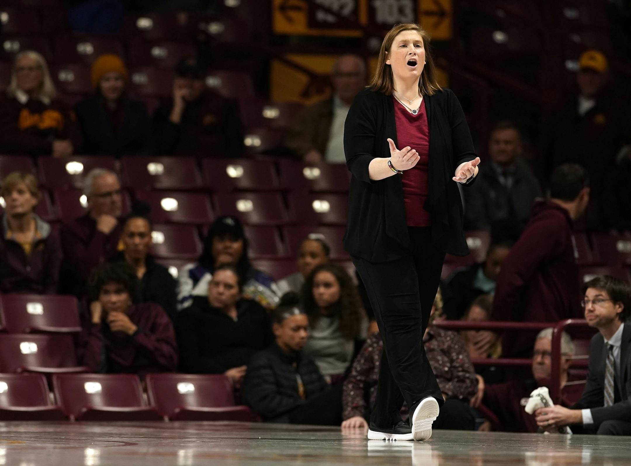 Minnesota head coach Lindsay Whalen expressed frustration with a call during the first half.