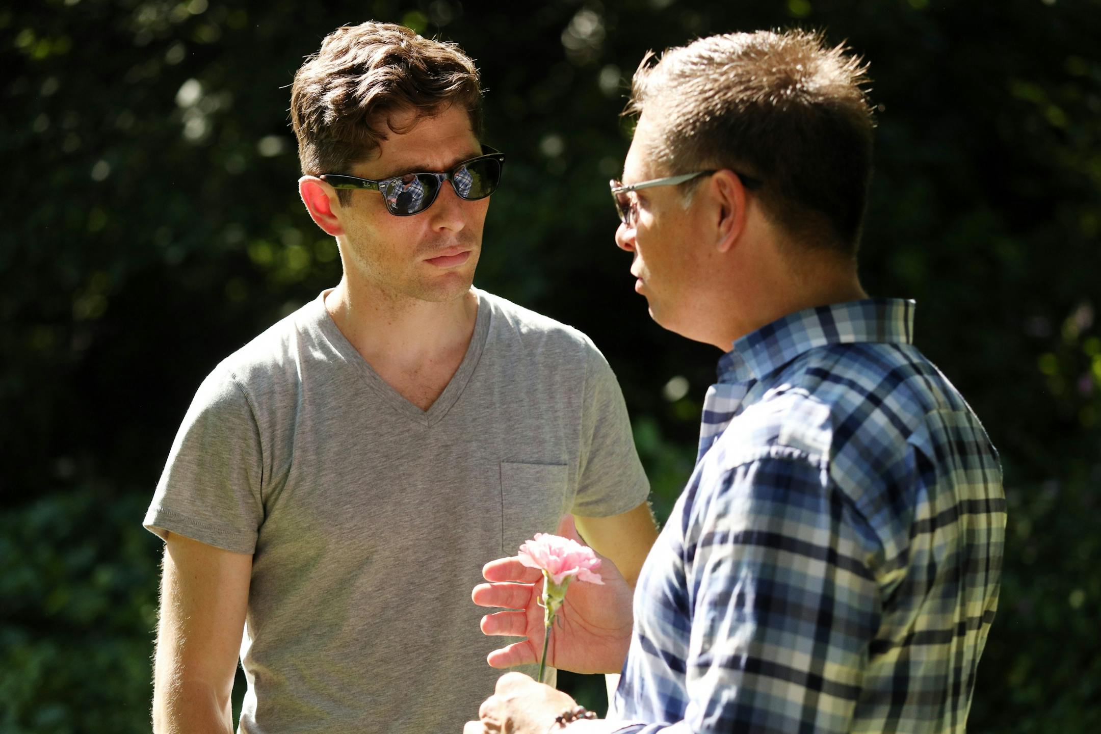 Minneapolis Mayor Jacob Frey talked with Don Damond following a gathering to dedicate a bench to Justine Ruszczyk Damond at Minnehaha Creek between 53rd and 54th streets on the one year anniversary of her death.