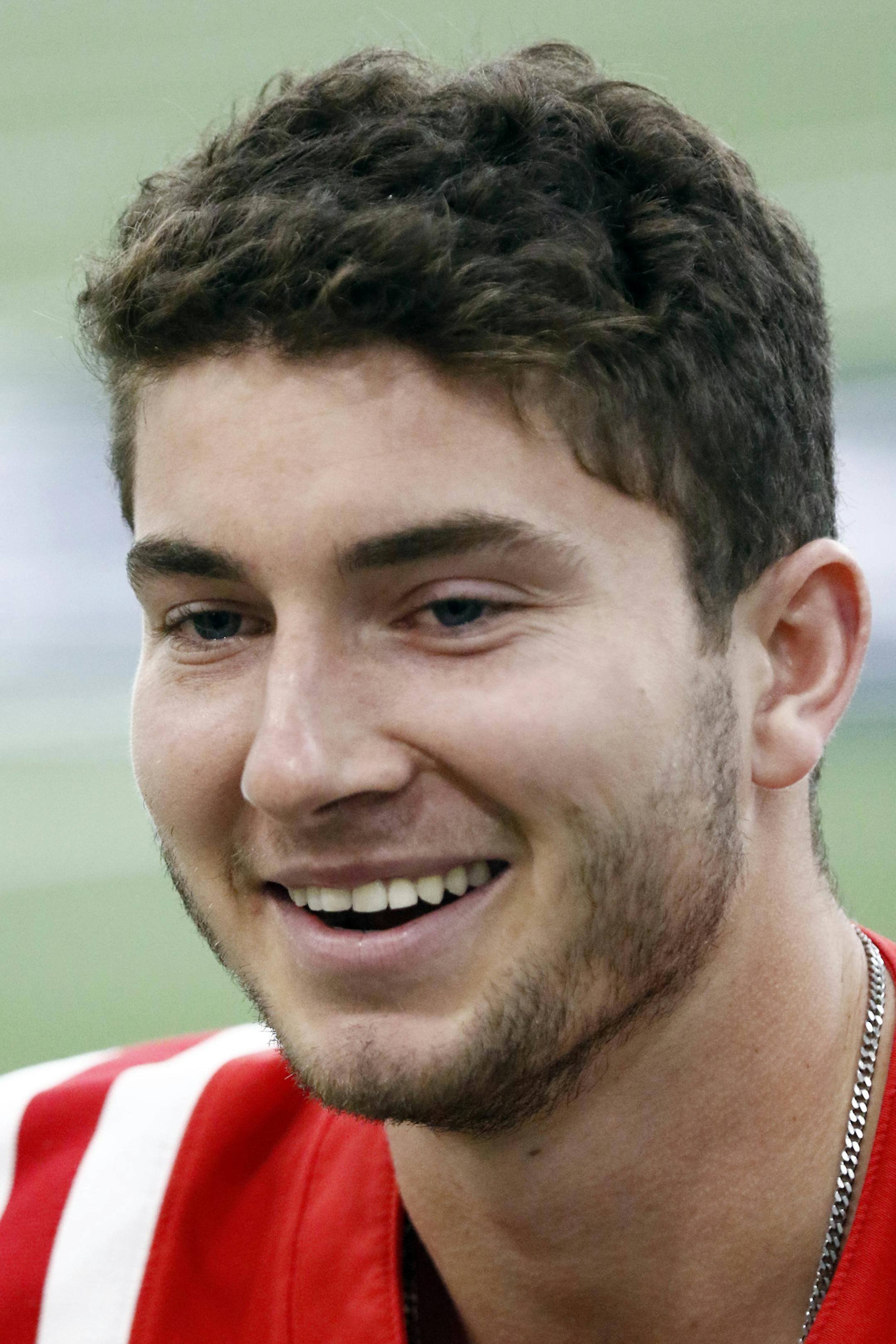 Mississippi quarterback Shea Patterson laughs while answering a reporter's question during the NCAA college football team's media day, Wednesday, Aug. 2, 2017, in Oxford, Miss. Mississippi opens its preseason camp after a tumultuous offseason highlighted by the stunning resignation of coach Hugh Freeze last month. (AP Photo/Rogelio V. Solis) ORG XMIT: MSRS108