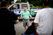 Scott Honour, one of four serious contenders in the GOP primary for governor, greeted people along the parade route at the Granite City Days parade in