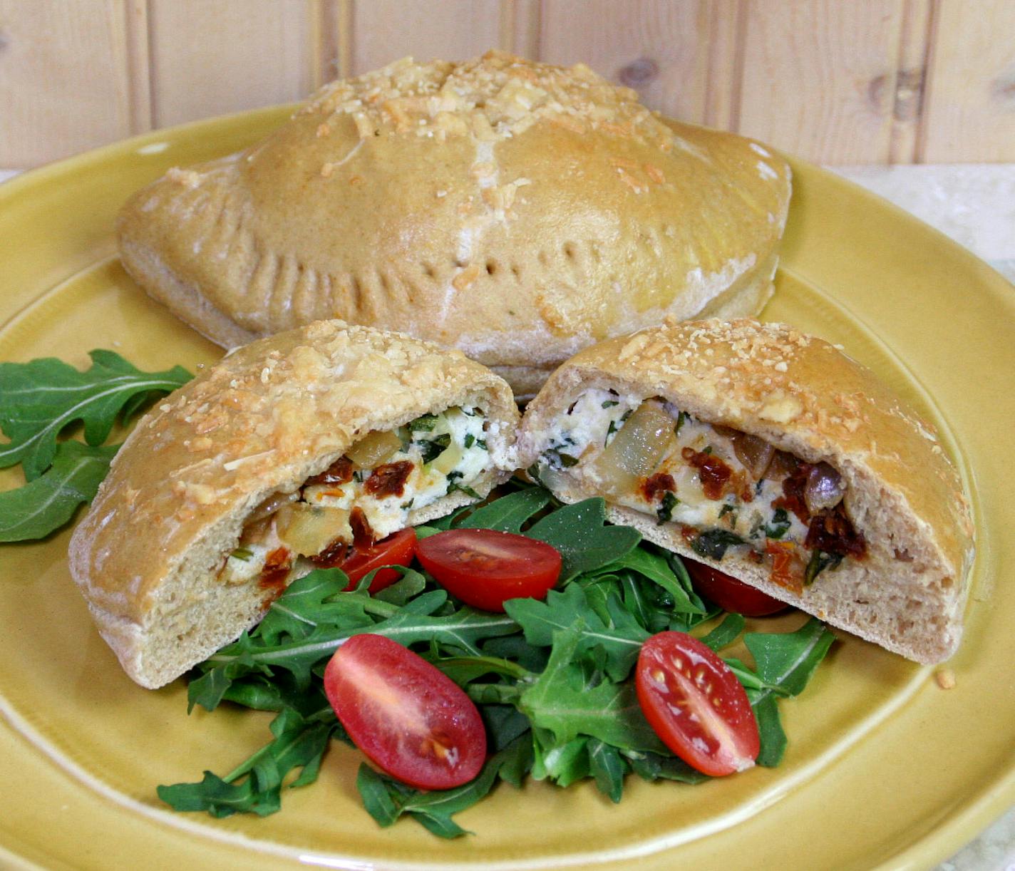 Arugula and Sun-Dried Tomato Calzones