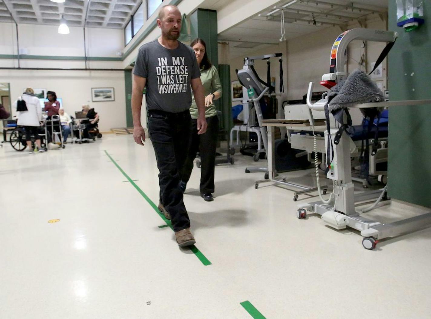 Justin Siltala of Cokato worked with HCMC physical therapist Kristy Ton Thursday, March 1, 2018, at HCMC in Minneapolis, MN. Sultana sustained a gruesome facial injury last November on his construction job, requiring brain surgery and reconstruction using a 3D printer to create a bone fragment for implant. HCMC is the first hospital in Minnesota to employ the technique.