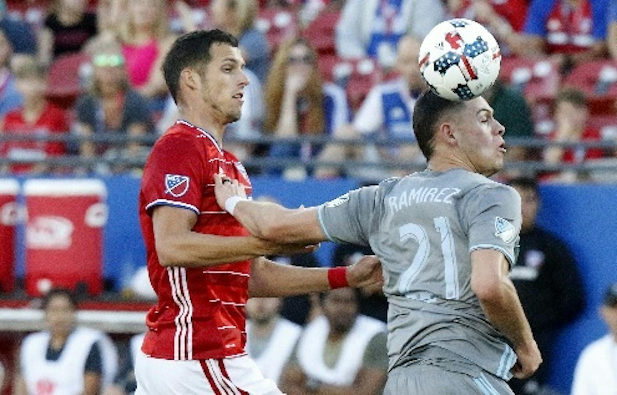 Christian Ramirez, right, after dealing Saturday with Dallas’ Matt Hedges, said United must “believe in what we’re doing.”