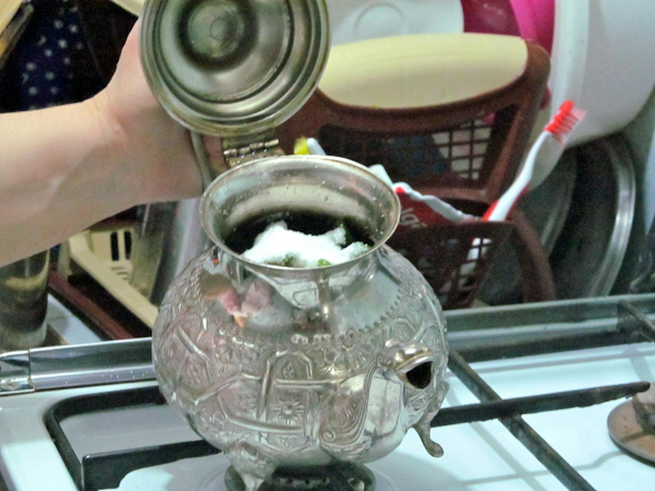 Our family teapot stuffed to the brim and ready to brew