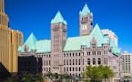 "The Municipal Building, which houses both the Minneapolis City Hall and the Hennepin County Courthouse. The building is built in the Richardsonian Ro