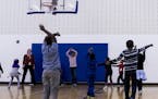 Children from a local school use the gym during physical education at the Brian Coyle Center on Monday, October 24, 2016, in Minneapolis, Minn. ] RENE