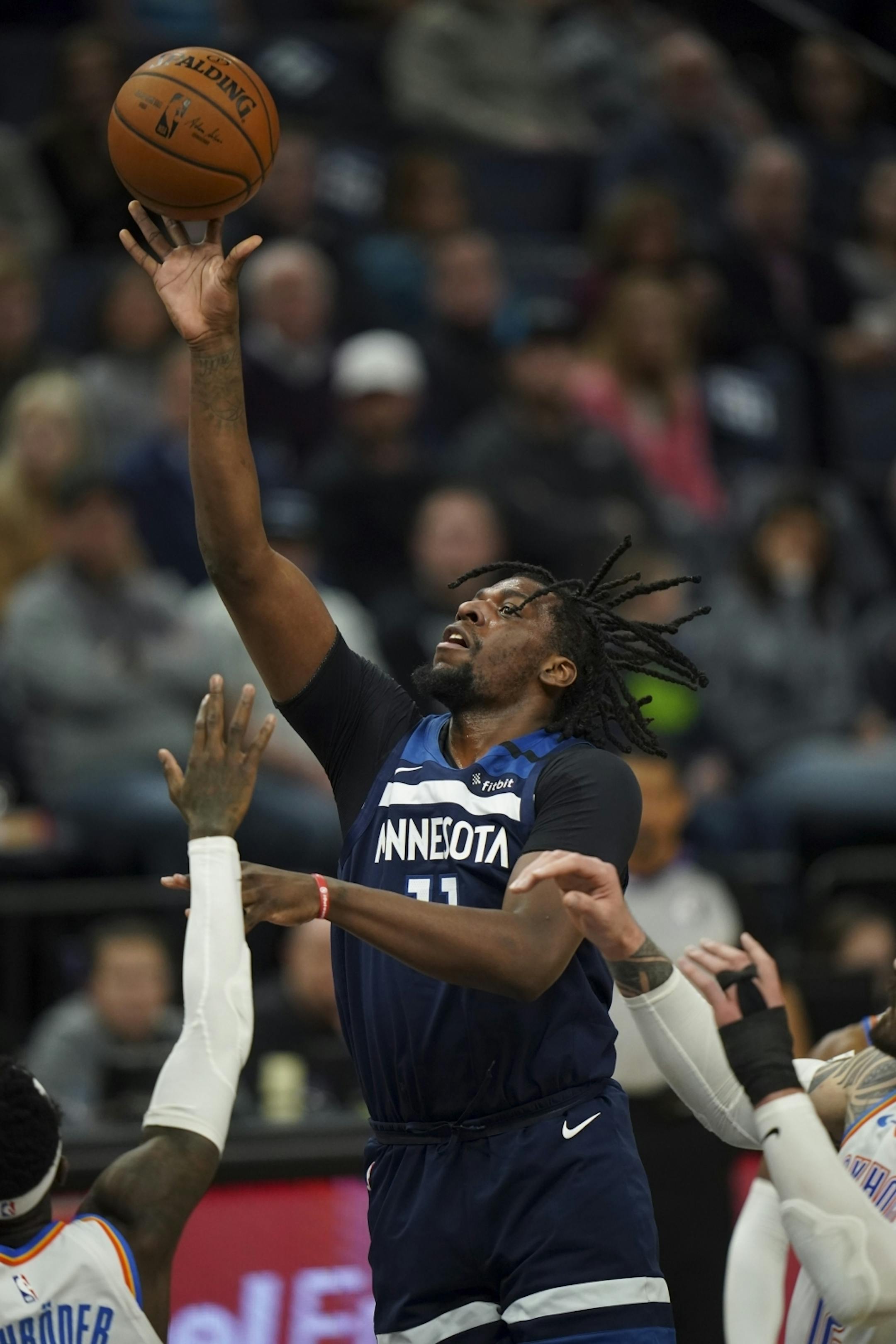 Minnesota Timberwolves center Naz Reid (11) put up a fourth quarter shot. He led the Wolves with 20 points.