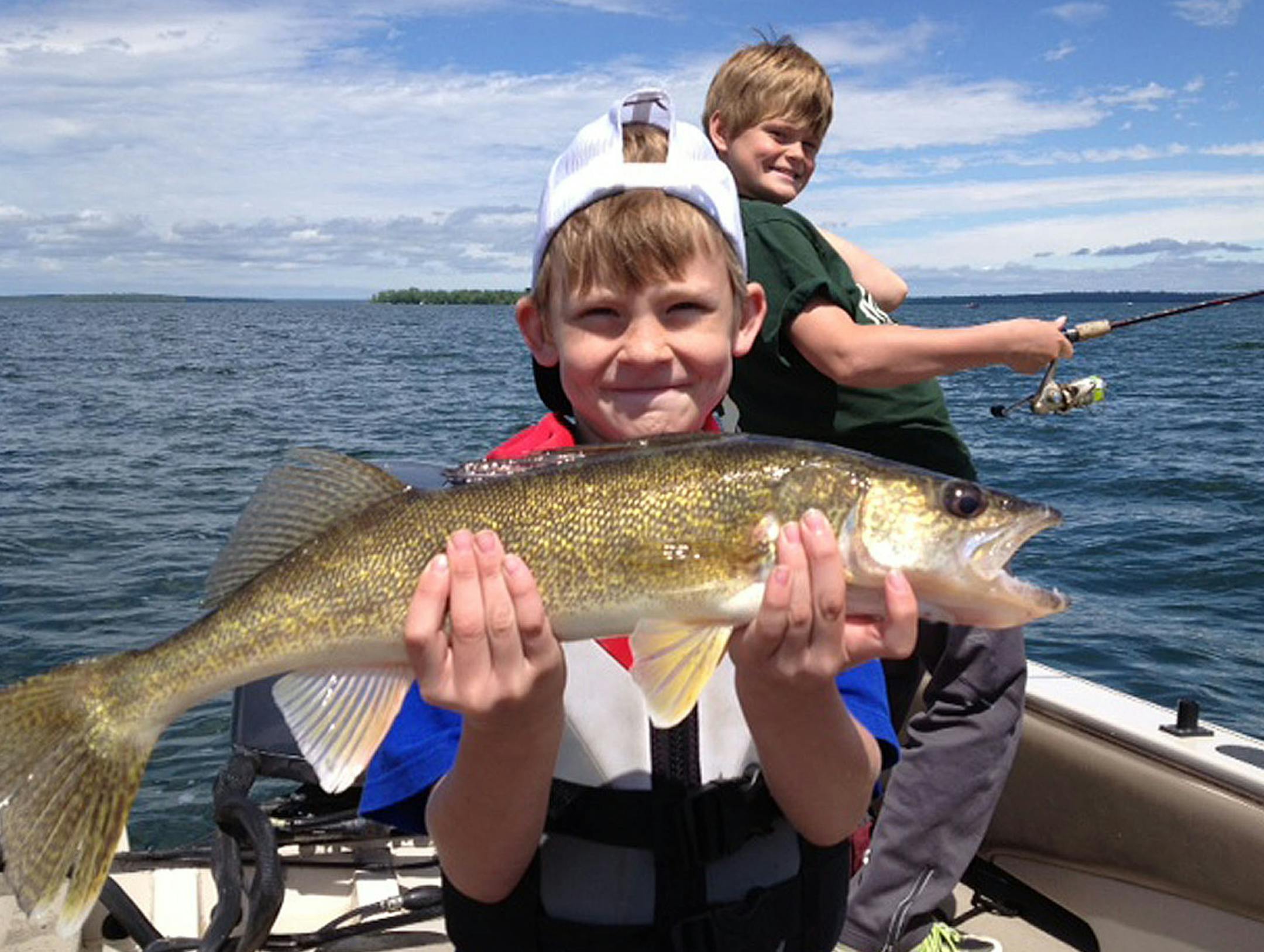 NICE FISH Fishing with his grandpa and brother on Leech Lake, 9-year-old Zack Enebak of Prior Lake caught and released this 23 -inch walleye.