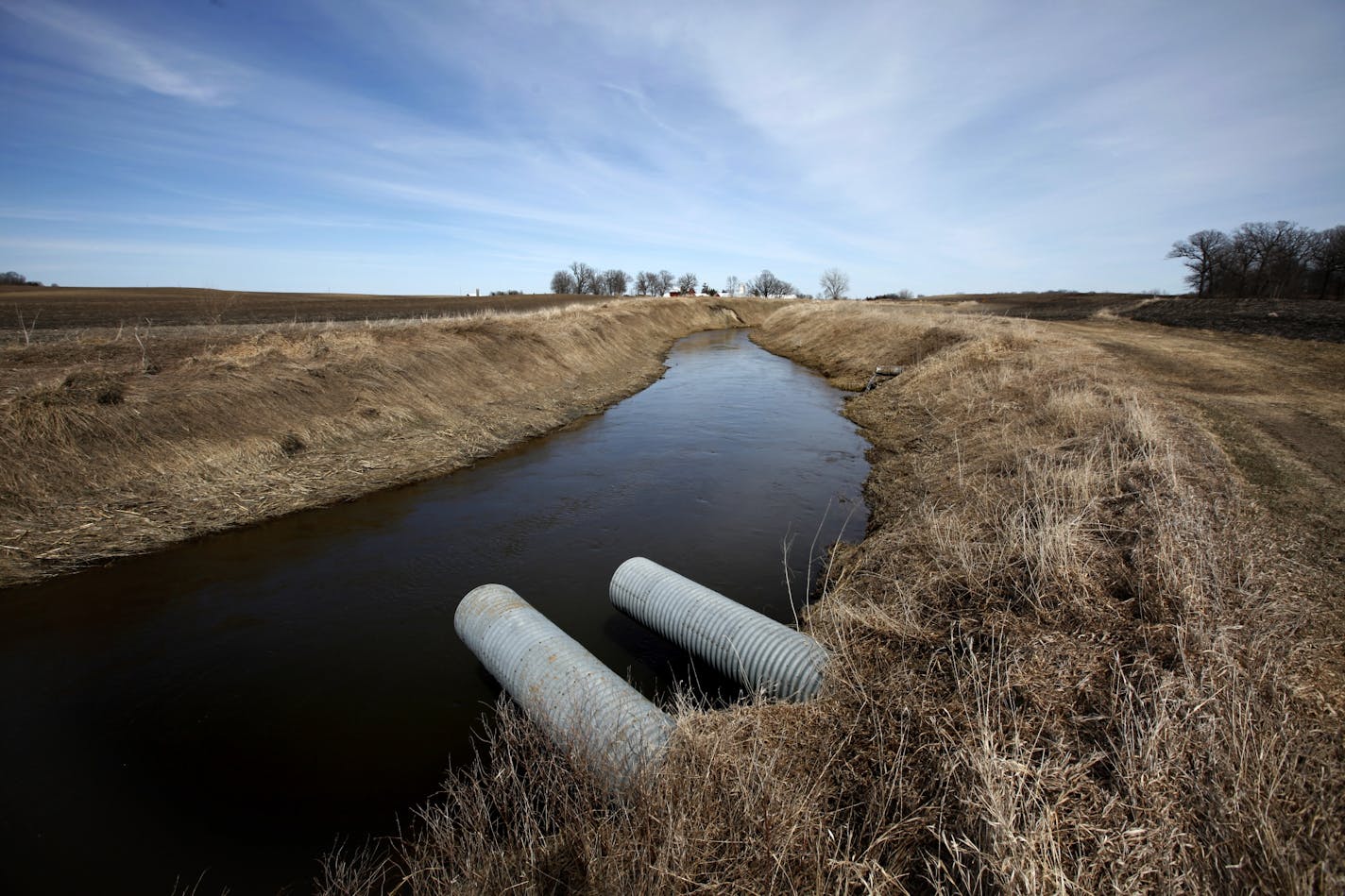 Drain tiles that lead from farm fields into ditches and then into the Minnesota River contribute to the sediment now being deposited in Lake Pepin.