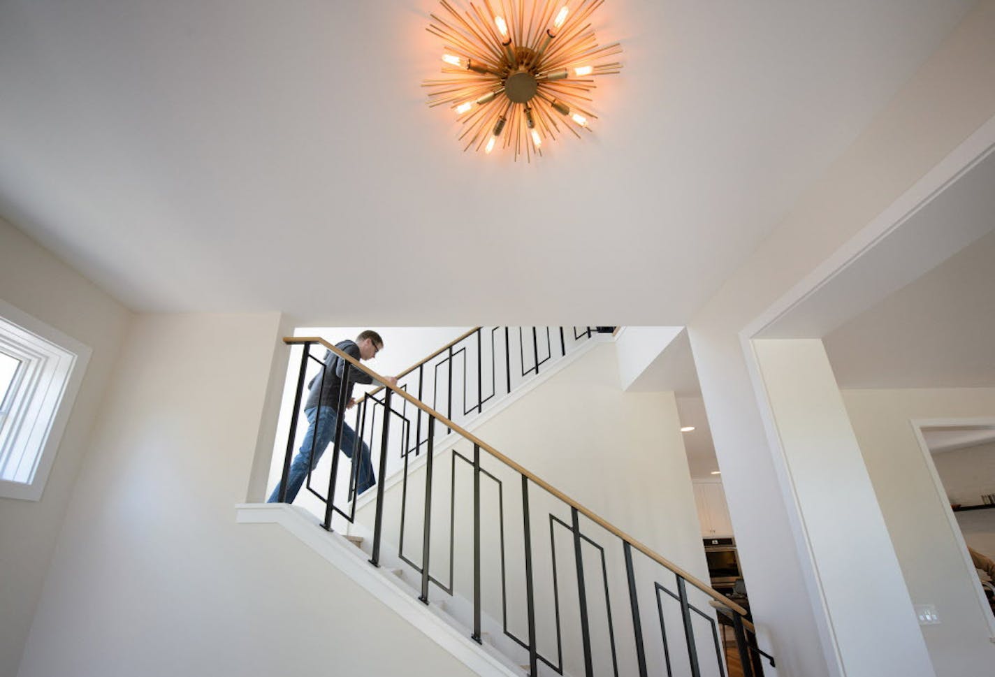 Stairs to second floor. ] GLEN STUBBE * gstubbe@startribune.com Tuesday, May 17, 2016 Highlight from the upcoming Artisan Home Tour, a modern house in an established traditional neighborhood in Edina. This year's tour marks the return of the upper-bracket spec house; they all but disappeared when the housing market tanked. The builder Andy Porter is in some of the photos as is designer Bridget Burns of Blend Interior Design. Home is 6028 Oaklawn Ave. S., Edina, MN