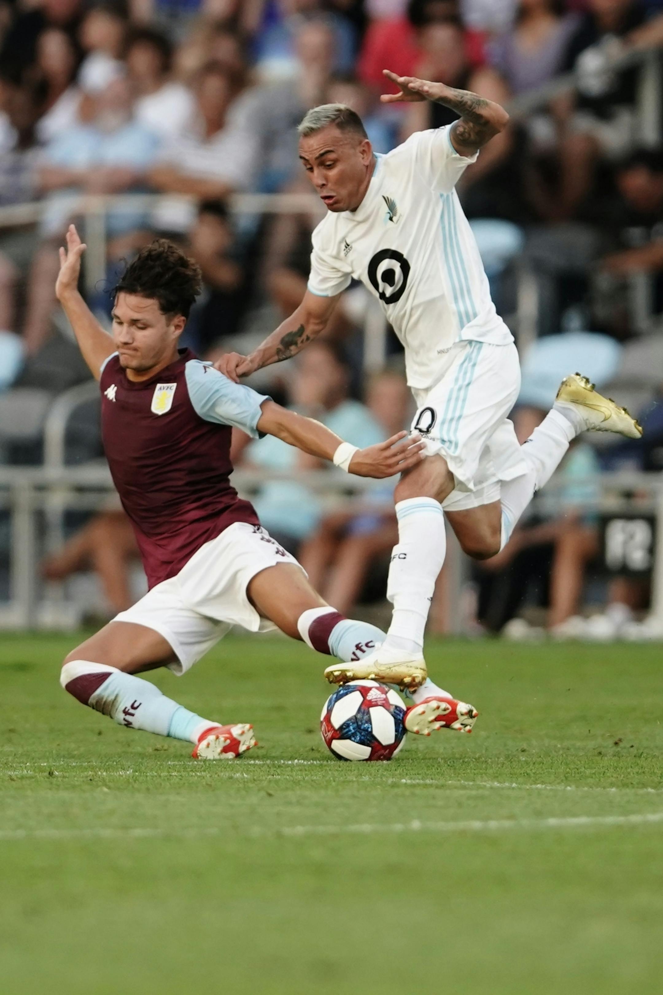 Minnesota United midfielder Miguel Ibarra (10) got tangled up with an Aston Villa player in the first half. Aston Villa and the Minnesota United remained tied 0-0 at the end of the first half.