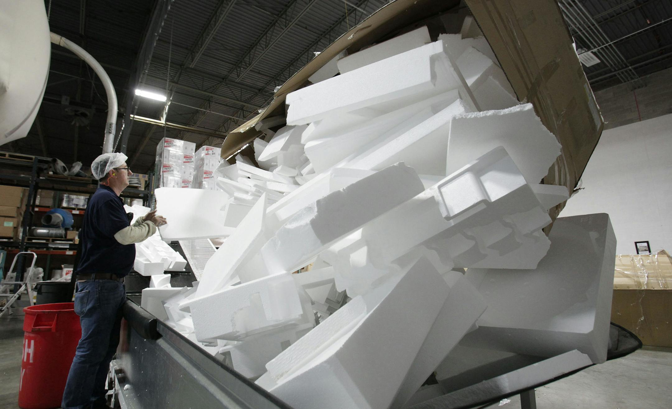In this July 28, 2011 photo, Styrofoam is dumped in a recycling machine at the DART Container Corp., plant in Lodi, Calif. A measure by state Sen. Alan Lowenthal, D-Long Beach, if approved by the legislature and signed by Gov. Jerry Brown, would prohibit restaurants, grocery stores and other venders from dispensing food in expanded polystyrene containers, commonly known as Styrofoam, beginning in 2016. DART, which makes Styrofoam food containers and employs about 600 people in the state is again