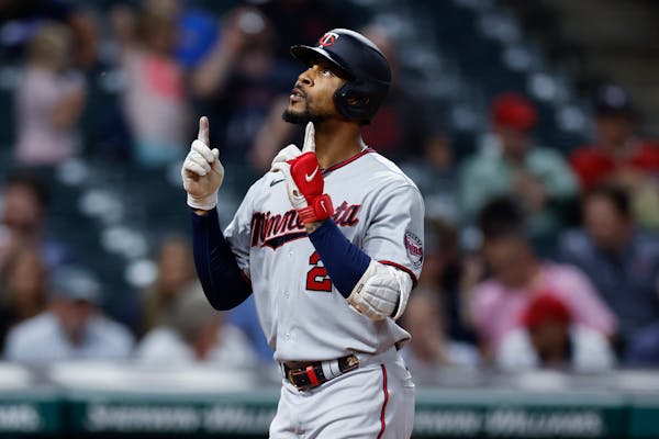 Byron Buxton celebrates after hitting a solo home run against the Guardians during the ninth inning Tuesday night.