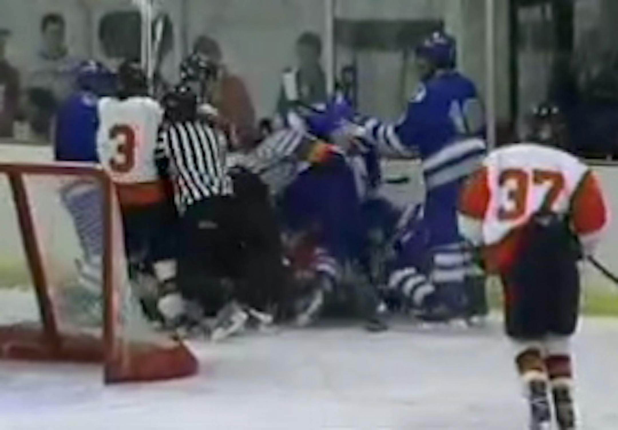 A brawl broke out after a dangerous check from behind Thursday night during a high school hockey game between Winona and visitor Owatonna.