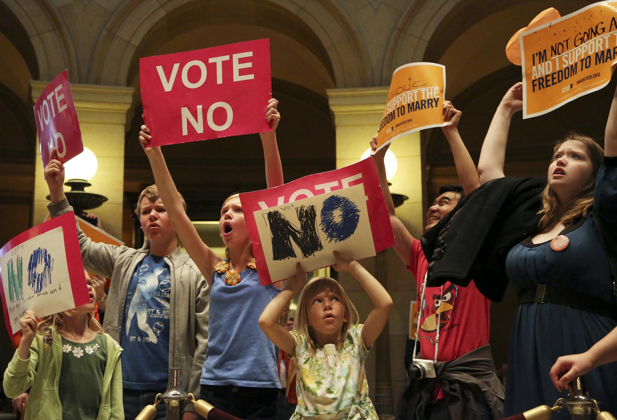 Opponents and proponents shared space in the rotunda prior the gay marriage bill passing the house Thursday, May 9, at the State Capitol in St. Paul, MN.](DAVID JOLES/STARTRIBUNE) djoles@startribune.com In a historic vote, a bipartisan coalition in the Minnesota House passed a measure that would legalize same-sex marriage in the state. The dramatic vote came after a passionate, hours-long debate that culminated when several Republican members who had been privately wrestling with the issue joine
