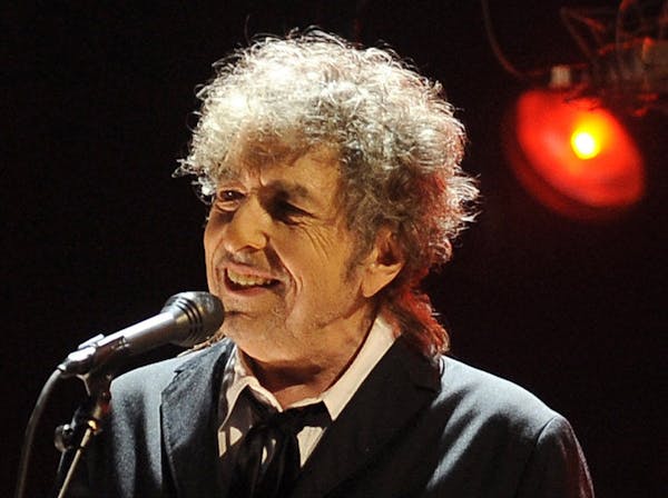 Bob Dylan performs in Los Angeles, Jan. 12, 2012.