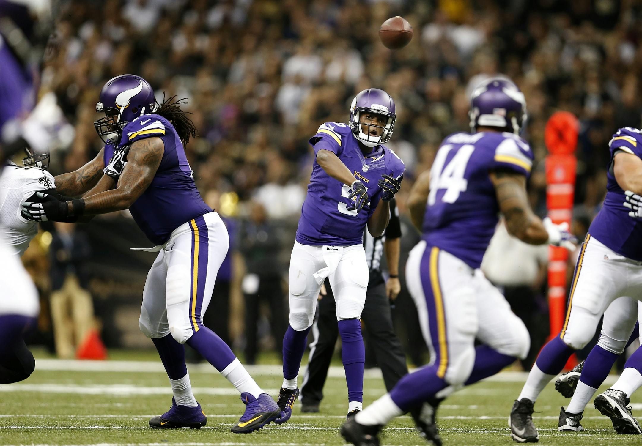 Minnesota Vikings rookie quarterback Teddy Bridgewater (5) attempted a pass in the third quarter of Sunday's game.