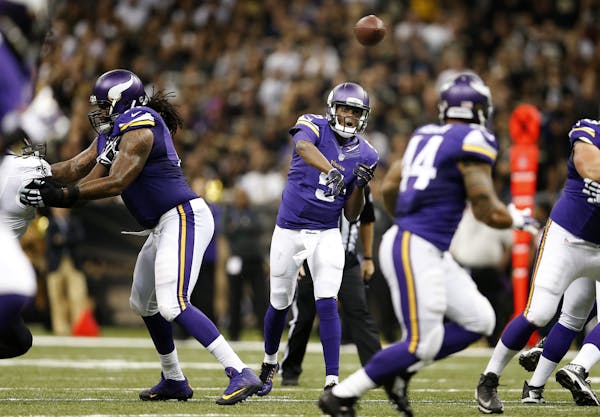 Minnesota Vikings rookie quarterback Teddy Bridgewater (5) attempted a pass in the third quarter of Sunday's game.
