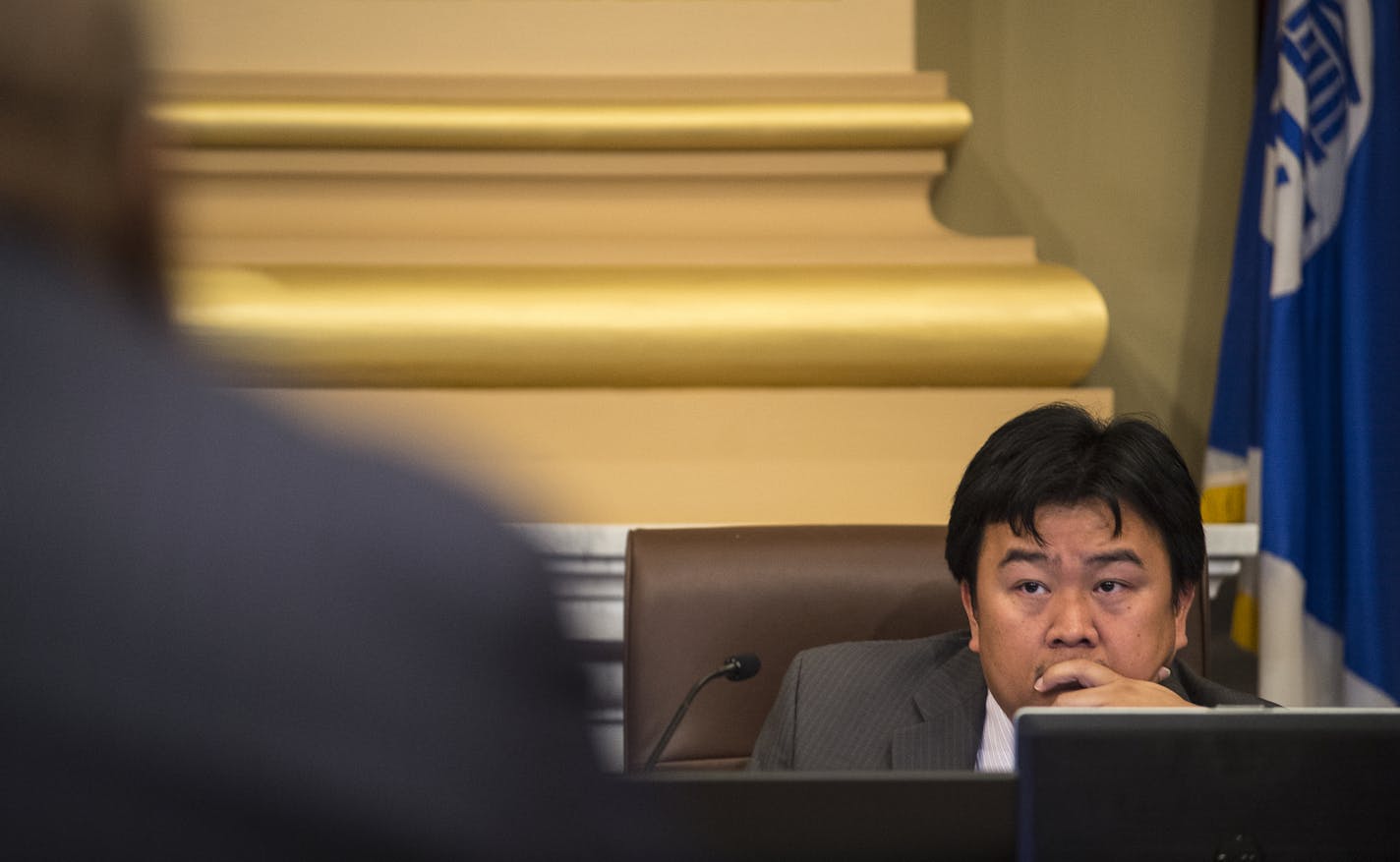 Ward 5 City Councilman Blong Yang listened to Clinton Collins Jr. as he spoke critically of Black Lives Matters' tactics in the ongoing 4th Precinct protests during a Minneapolis City Council public safety meeting Wednesday. ] (AARON LAVINSKY/STAR TRIBUNE) aaron.lavinsky@startribune.com The Minneapolis City Council held a public safety meeting on Wednesday, Dec. 2, 2015 at Minneapolis City Hall. The public was able to address the council on issues pertaining to the ongoing protest outside the 4t