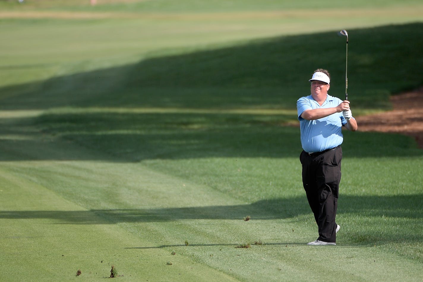 Tim Herron watches his shot from the ninth fairway during the final round of the Arnold Palmer Invitational last March.