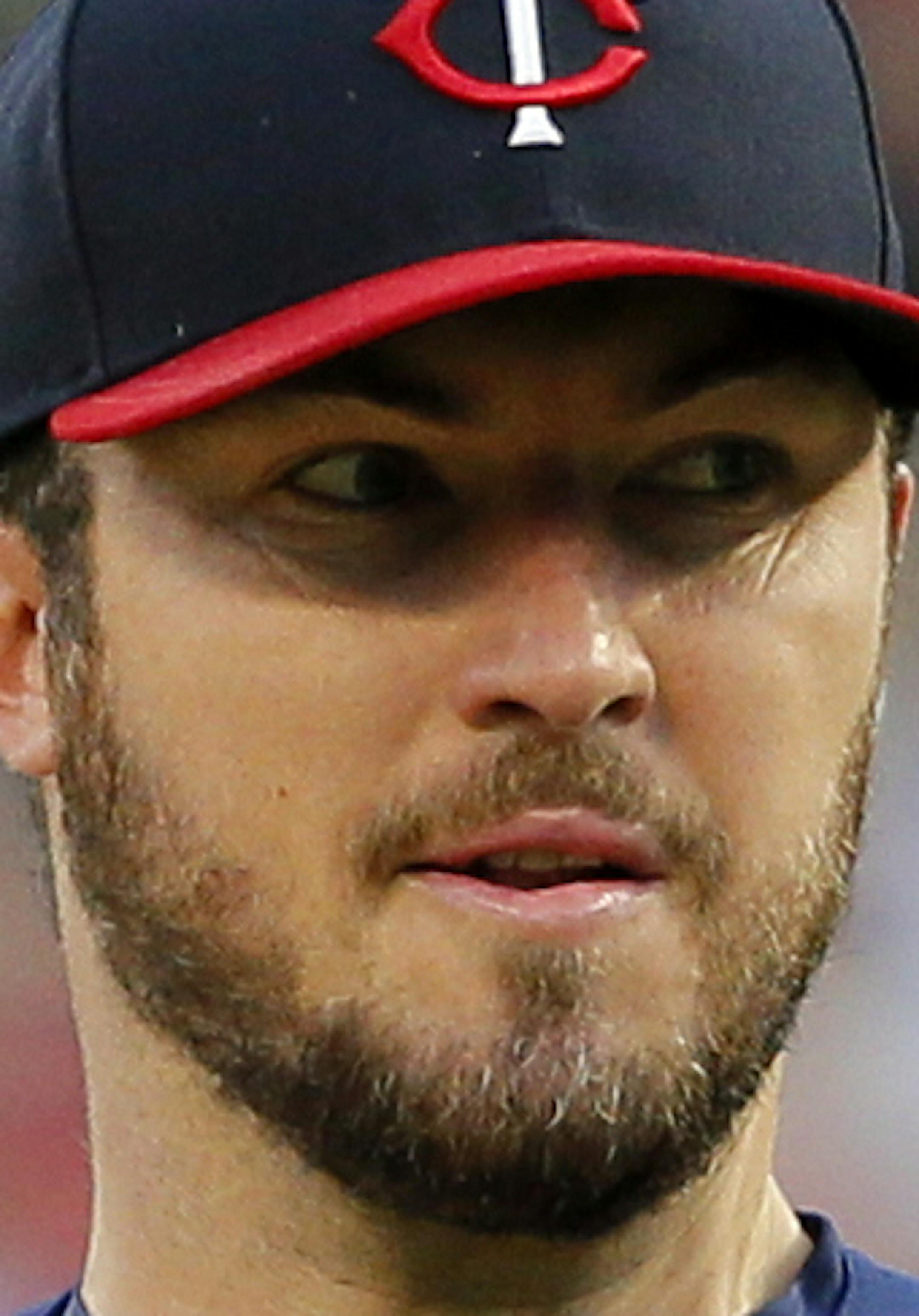 Minnesota Twins starting pitcher Phil Hughes throws against the Texas Rangers in the first inning of a baseball game in Arlington, Texas, Monday April 24, 2017. (AP Photo/Tony Gutierrez)
