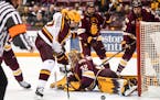 Brannon McManus, left, and the Gophers will play host to two-time defending NCAA champion Minnesota Duluth, led by goalie Hunter Shepard, on Oct. 25 a